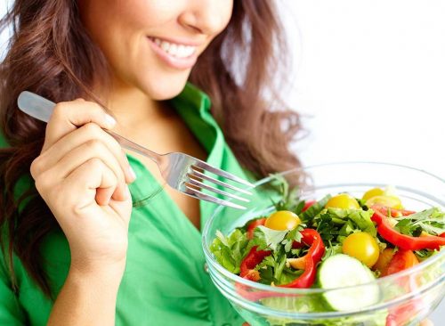 Intuitive Eating, Weight loss diet, Lining Healthy,Hints to Lower them, A Woman enjoying eating salad.