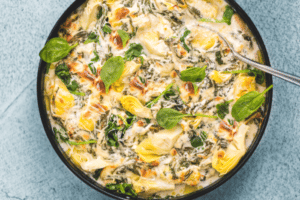 Spinach Artichoke Baked Chicken | Essentially a Delicious