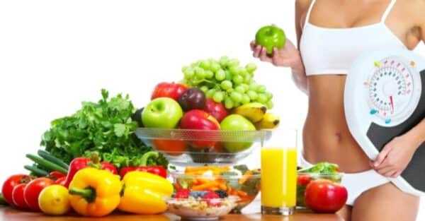 Lean healthy dishes, young healthy woman with fruits and vegetables